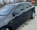Чорний Опель Інсігнія, об'ємом двигуна 1.96 л та пробігом 260 тис. км за 5999 $, фото 12 на Automoto.ua