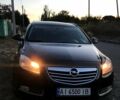 Черный Опель Инсигния, объемом двигателя 2 л и пробегом 327 тыс. км за 6950 $, фото 1 на Automoto.ua