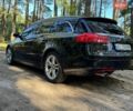 Чорний Опель Інсігнія, об'ємом двигуна 2 л та пробігом 325 тис. км за 6500 $, фото 5 на Automoto.ua
