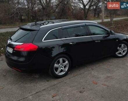 Черный Опель Инсигния, объемом двигателя 2 л и пробегом 265 тыс. км за 5750 $, фото 7 на Automoto.ua