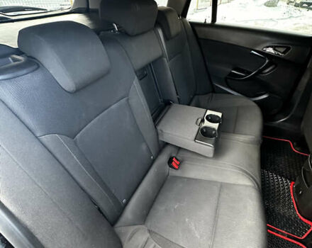 Чорний Опель Інсігнія, об'ємом двигуна 1.96 л та пробігом 220 тис. км за 6450 $, фото 19 на Automoto.ua