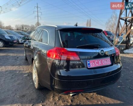 Чорний Опель Інсігнія, об'ємом двигуна 1.8 л та пробігом 242 тис. км за 6999 $, фото 5 на Automoto.ua