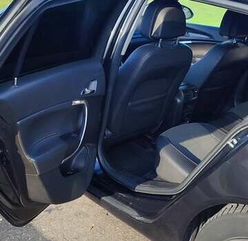 Чорний Опель Інсігнія, об'ємом двигуна 1.96 л та пробігом 267 тис. км за 7545 $, фото 7 на Automoto.ua