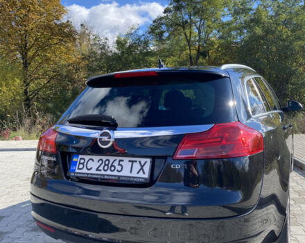 Чорний Опель Інсігнія, об'ємом двигуна 1.96 л та пробігом 231 тис. км за 6650 $, фото 2 на Automoto.ua