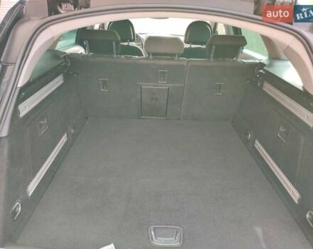 Черный Опель Инсигния, объемом двигателя 2 л и пробегом 278 тыс. км за 7500 $, фото 3 на Automoto.ua