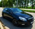 Чорний Опель Інсігнія, об'ємом двигуна 2 л та пробігом 298 тис. км за 6500 $, фото 1 на Automoto.ua