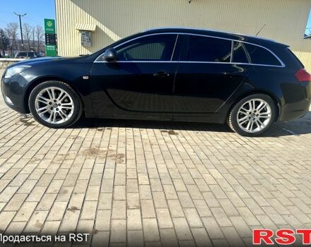 Черный Опель Инсигния, объемом двигателя 2 л и пробегом 296 тыс. км за 7000 $, фото 2 на Automoto.ua