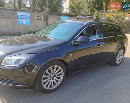 Черный Опель Инсигния, объемом двигателя 2 л и пробегом 322 тыс. км за 7500 $, фото 1 на Automoto.ua