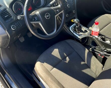 Черный Опель Инсигния, объемом двигателя 2 л и пробегом 280 тыс. км за 6500 $, фото 4 на Automoto.ua