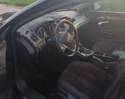 Чорний Опель Інсігнія, об'ємом двигуна 2 л та пробігом 242 тис. км за 6500 $, фото 1 на Automoto.ua