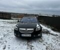 Чорний Опель Інсігнія, об'ємом двигуна 2 л та пробігом 320 тис. км за 7999 $, фото 2 на Automoto.ua