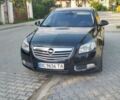 Чорний Опель Інсігнія, об'ємом двигуна 1.96 л та пробігом 243 тис. км за 7950 $, фото 1 на Automoto.ua