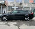 Чорний Опель Інсігнія, об'ємом двигуна 1.96 л та пробігом 249 тис. км за 10350 $, фото 5 на Automoto.ua