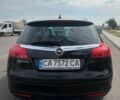 Черный Опель Инсигния, объемом двигателя 2 л и пробегом 265 тыс. км за 8100 $, фото 5 на Automoto.ua