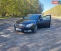 Черный Опель Инсигния, объемом двигателя 2 л и пробегом 248 тыс. км за 7800 $, фото 1 на Automoto.ua