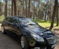 Чорний Опель Інсігнія, об'ємом двигуна 2 л та пробігом 190 тис. км за 9000 $, фото 4 на Automoto.ua
