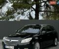 Черный Опель Инсигния, объемом двигателя 2 л и пробегом 268 тыс. км за 7300 $, фото 1 на Automoto.ua