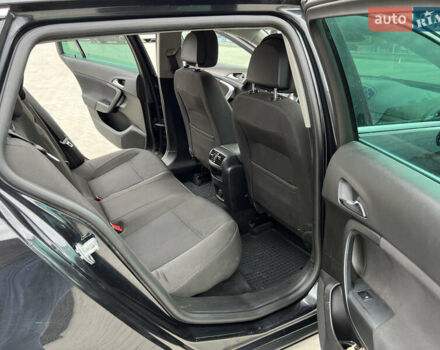 Черный Опель Инсигния, объемом двигателя 1.96 л и пробегом 230 тыс. км за 8500 $, фото 15 на Automoto.ua