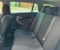 Черный Опель Инсигния, объемом двигателя 1.96 л и пробегом 230 тыс. км за 7500 $, фото 5 на Automoto.ua
