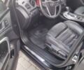 Чорний Опель Інсігнія, об'ємом двигуна 1.96 л та пробігом 243 тис. км за 7950 $, фото 8 на Automoto.ua
