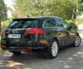 Чорний Опель Інсігнія, об'ємом двигуна 2 л та пробігом 225 тис. км за 6765 $, фото 3 на Automoto.ua