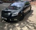 Чорний Опель Інсігнія, об'ємом двигуна 2 л та пробігом 280 тис. км за 7500 $, фото 1 на Automoto.ua