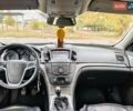 Чорний Опель Інсігнія, об'ємом двигуна 1.96 л та пробігом 243 тис. км за 8300 $, фото 7 на Automoto.ua