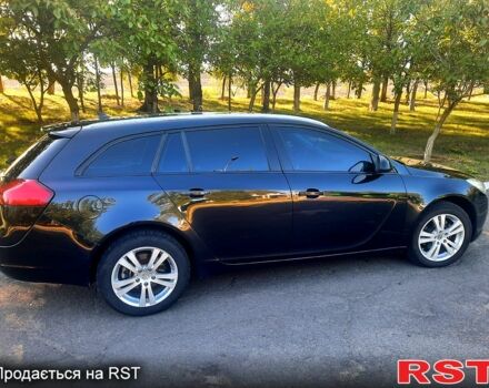 Чорний Опель Інсігнія, об'ємом двигуна 2 л та пробігом 300 тис. км за 7900 $, фото 5 на Automoto.ua