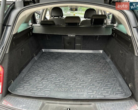 Черный Опель Инсигния, объемом двигателя 1.96 л и пробегом 230 тыс. км за 8500 $, фото 9 на Automoto.ua