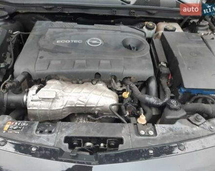 Чорний Опель Інсігнія, об'ємом двигуна 2 л та пробігом 214 тис. км за 12000 $, фото 5 на Automoto.ua