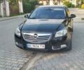 Чорний Опель Інсігнія, об'ємом двигуна 1.96 л та пробігом 243 тис. км за 7950 $, фото 1 на Automoto.ua