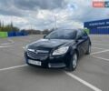 Черный Опель Инсигния, объемом двигателя 1.96 л и пробегом 323 тыс. км за 6500 $, фото 1 на Automoto.ua