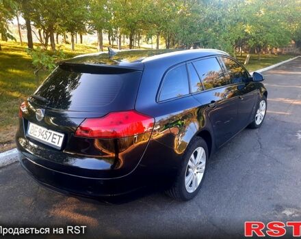 Чорний Опель Інсігнія, об'ємом двигуна 2 л та пробігом 300 тис. км за 7900 $, фото 4 на Automoto.ua