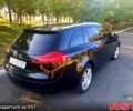 Чорний Опель Інсігнія, об'ємом двигуна 2 л та пробігом 300 тис. км за 7900 $, фото 4 на Automoto.ua