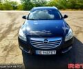 Черный Опель Инсигния, объемом двигателя 2 л и пробегом 300 тыс. км за 7200 $, фото 1 на Automoto.ua