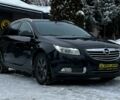 Чорний Опель Інсігнія, об'ємом двигуна 2 л та пробігом 231 тис. км за 8999 $, фото 1 на Automoto.ua