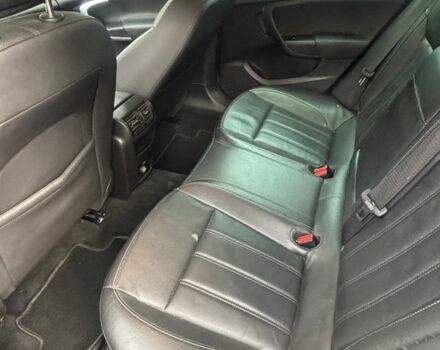 Чорний Опель Інсігнія, об'ємом двигуна 2 л та пробігом 333 тис. км за 10150 $, фото 6 на Automoto.ua