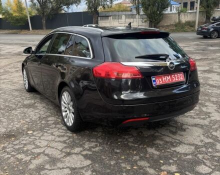 Чорний Опель Інсігнія, об'ємом двигуна 2 л та пробігом 333 тис. км за 10150 $, фото 4 на Automoto.ua