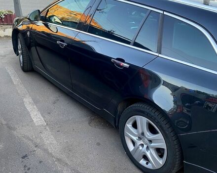 Черный Опель Инсигния, объемом двигателя 2 л и пробегом 200 тыс. км за 9500 $, фото 5 на Automoto.ua