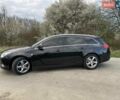 Черный Опель Инсигния, объемом двигателя 1.96 л и пробегом 296 тыс. км за 7500 $, фото 1 на Automoto.ua