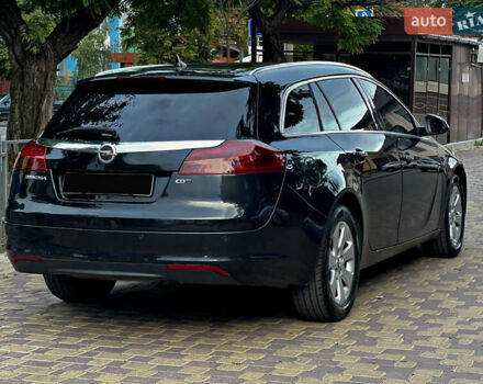 Опель Инсигния 2011 в Новоселица на Automoto.ua Черный Опель Инсигния, объемом двигателя 1.96 л и пробегом 378 тыс. км за 9200 $, фото 4 на Automoto.ua
