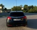 Чорний Опель Інсігнія, об'ємом двигуна 1.96 л та пробігом 245 тис. км за 6999 $, фото 3 на Automoto.ua