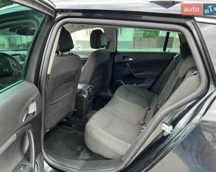 Черный Опель Инсигния, объемом двигателя 1.96 л и пробегом 230 тыс. км за 8500 $, фото 17 на Automoto.ua