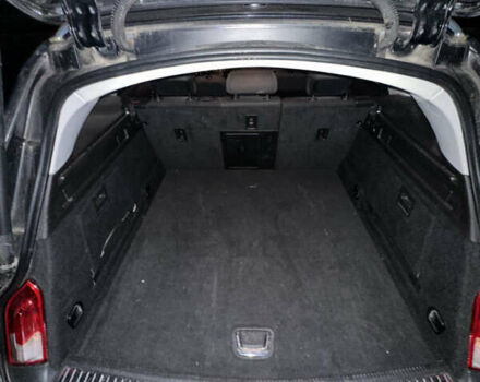 Чорний Опель Інсігнія, об'ємом двигуна 1.96 л та пробігом 215 тис. км за 7777 $, фото 6 на Automoto.ua