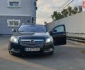 Черный Опель Инсигния, объемом двигателя 1.96 л и пробегом 318 тыс. км за 7500 $, фото 5 на Automoto.ua