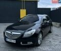 Чорний Опель Інсігнія, об'ємом двигуна 1.96 л та пробігом 262 тис. км за 7600 $, фото 1 на Automoto.ua