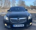 Чорний Опель Інсігнія, об'ємом двигуна 1.96 л та пробігом 250 тис. км за 6850 $, фото 1 на Automoto.ua