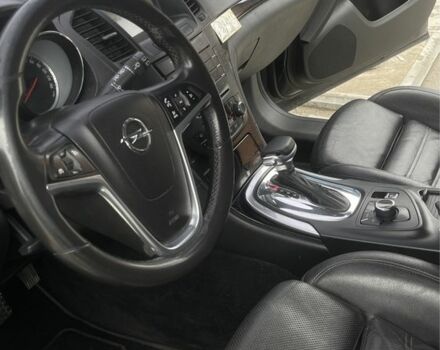 Чорний Опель Інсігнія, об'ємом двигуна 2 л та пробігом 362 тис. км за 8900 $, фото 5 на Automoto.ua