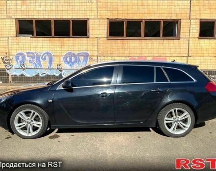 Черный Опель Инсигния, объемом двигателя 2 л и пробегом 29000 тыс. км за 7250 $, фото 1 на Automoto.ua