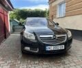 Чорний Опель Інсігнія, об'ємом двигуна 2 л та пробігом 312 тис. км за 6799 $, фото 1 на Automoto.ua